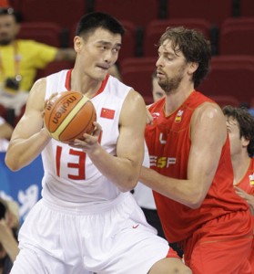China's Yao Ming battles Spain's Pau Gasol at the 2008 Olympics in Beijing.