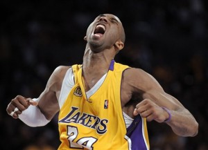 Kobe Bryant screams after sinking a 3-pointer during a playoff game against Denver last year. (ASSOCIATED PRESS)