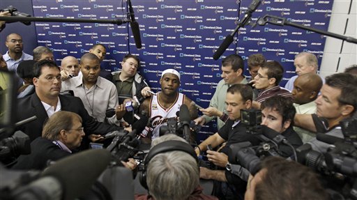 LeBron James is surrounded by microphones and cameras during the Cavaliers' Media Day. (ASSOCIATED PRESS)