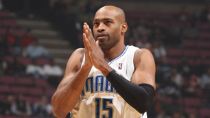 Vince Carter scored 16 points in his return to New Jersey but left the game with an ankle injury. (GETTY IMAGES)