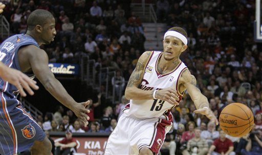 Cavaliers guard Delonte West, right, is defended by Raymond Felton of the Bobcats (ASSOCIATED PRESS)