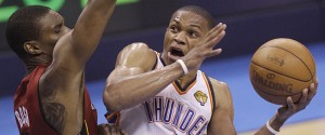 Russell Westbrook shoots over Chris Bosh during the second half of Game 1of the NBA Finals. (ASSOCIATED PRESS)