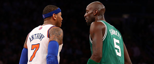 Carmelo Anthony confronts Kevin Garnett after the two got tangled and words were exchanged. (GETTY IMAGES)