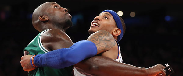 Things could get real physical between Celtics forward Kevin Garnett and Knicks forward Carmelo Anthony in the first round of the Eastern Conference playoffs. (GETTY IMAGES)