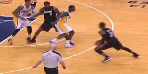 LeBron James is called for an offensive foul while setting a screen on Lance Stephenson.