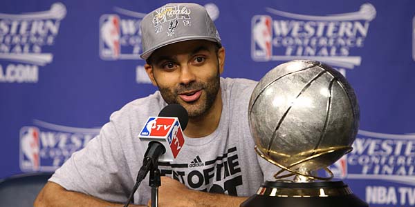 Tony Parker and the Spurs claim the 2013 Western Conference finals trophy. (GETTY IMAGES)