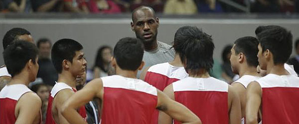 LeBron James holds a basketball clinic at the Mall of Asia in the Philippines. (ASSOCIATED PRESS)
