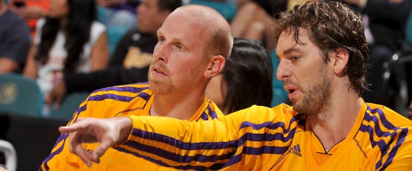 Chris Kaman will lean on Lakers veteran Pau Gasol to show him how things run in Mike D'Antoni's system. (GETTY IMAGES)