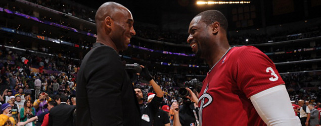 Kobe Bryant and Dwyane Wade share a laugh after the Heat-Lakers game on Christmas Day at Staples Center. (GETTY IMAGES)