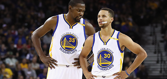 Kevin Durant and Stephen Curry form a formidable 1-2 punch in Golden State. (GETTY IMAGES)
